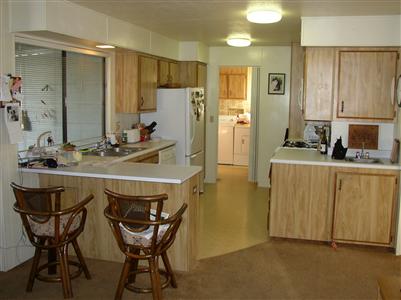 1945 Piner Road, Unit 70 Santa Rosa, CA 95403 - Photo 3 of 6 a bathroom with a sink a table and chairs