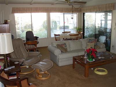 1945 Piner Road, Unit 70 Santa Rosa, CA 95403 - Photo 4 of 6 a living room with furniture and a large window