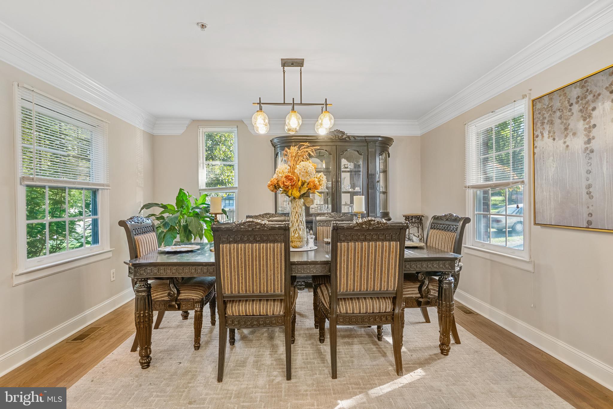 6202 State Street Cheverly, MD 20785 - Photo 15 of 34 a dining room with furniture a chandelier and window