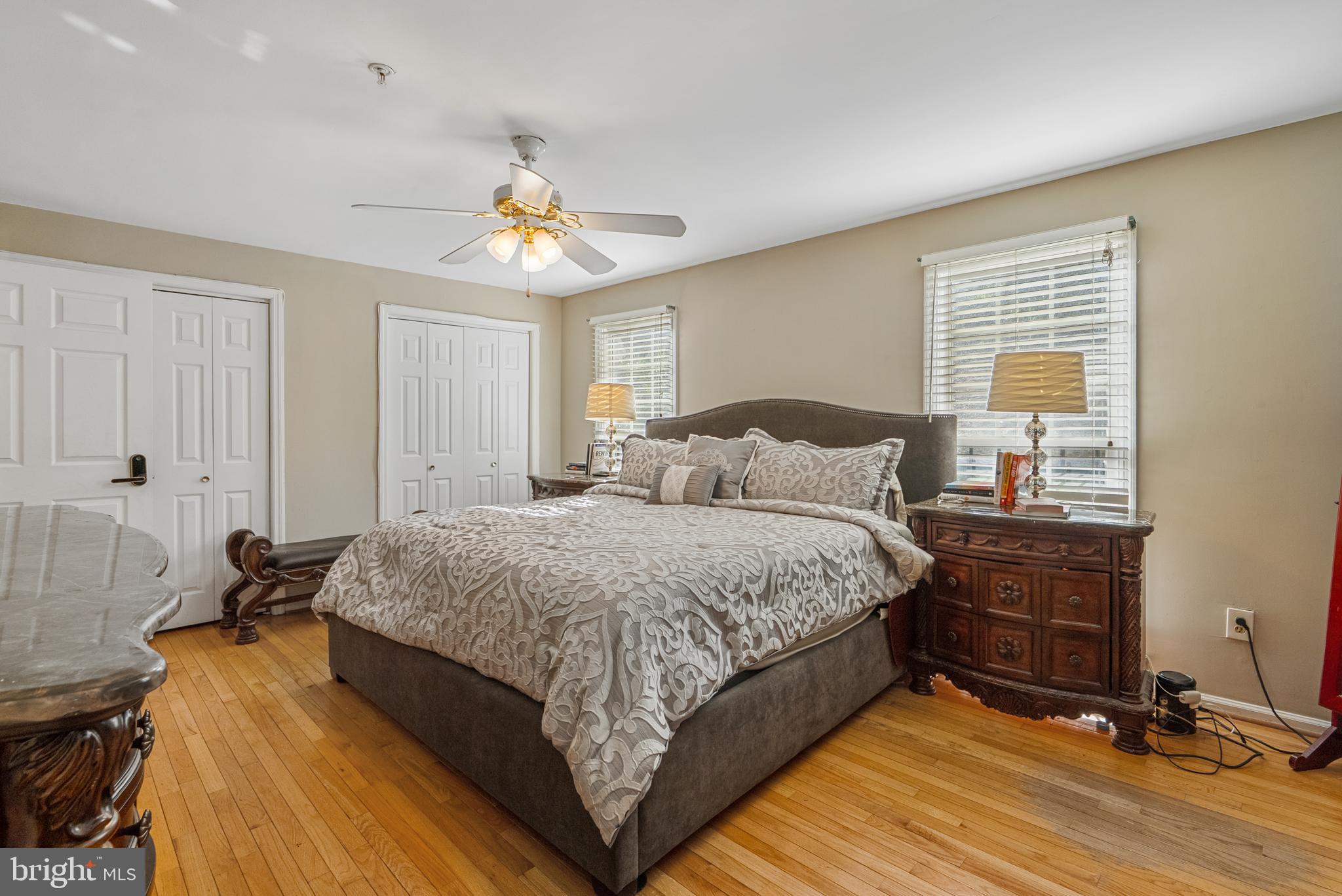 6202 State Street Cheverly, MD 20785 - Photo 26 of 34 a bedroom with a bed and wooden floor