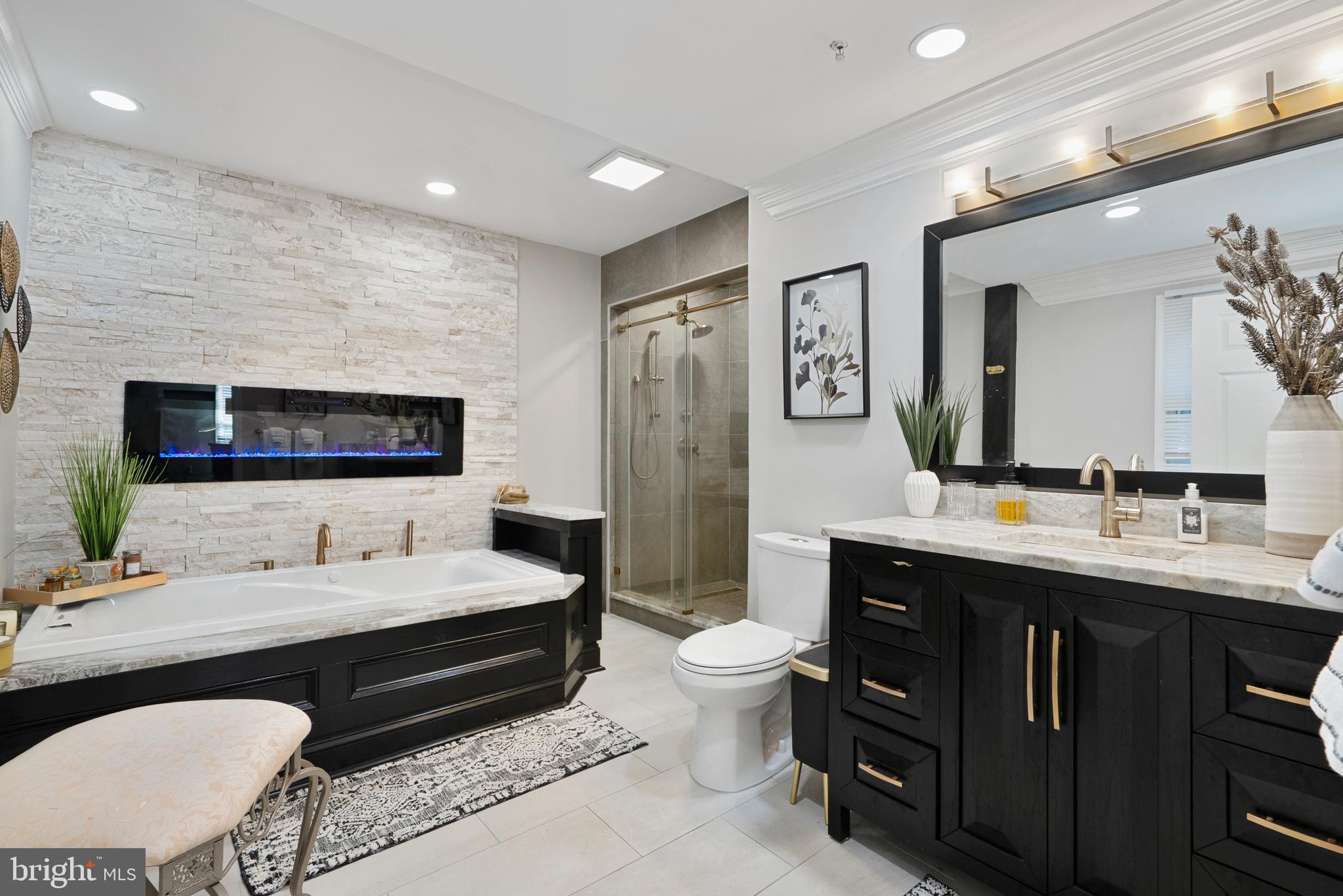 6202 State Street Cheverly, MD 20785 - Photo 28 of 34 a bathroom with a double vanity sink mirror and toilet