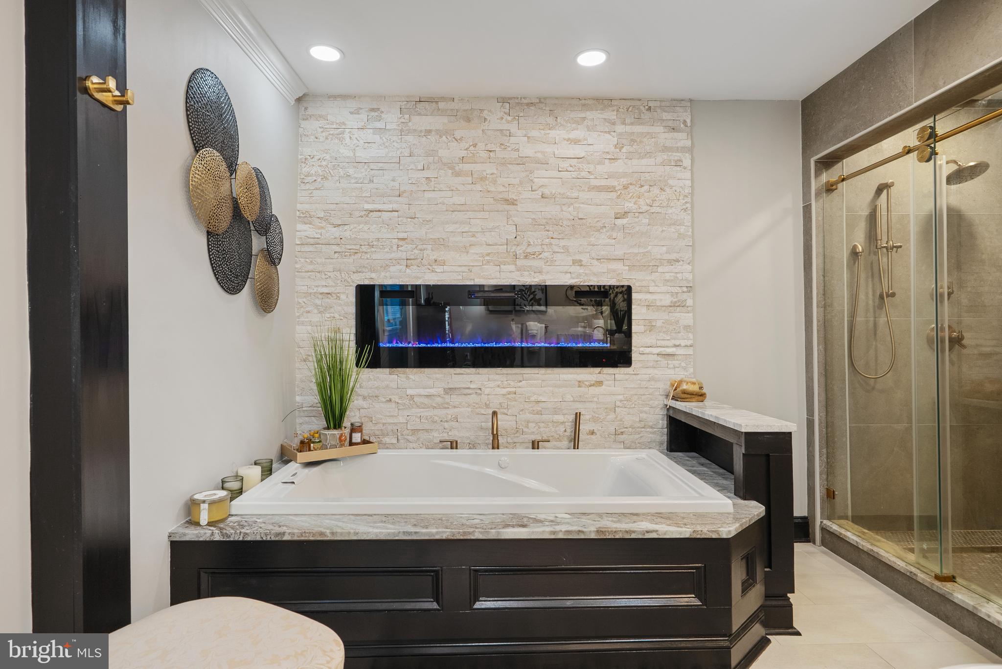 6202 State Street Cheverly, MD 20785 - Photo 29 of 34 a bathroom with a granite countertop sink a toilet and shower