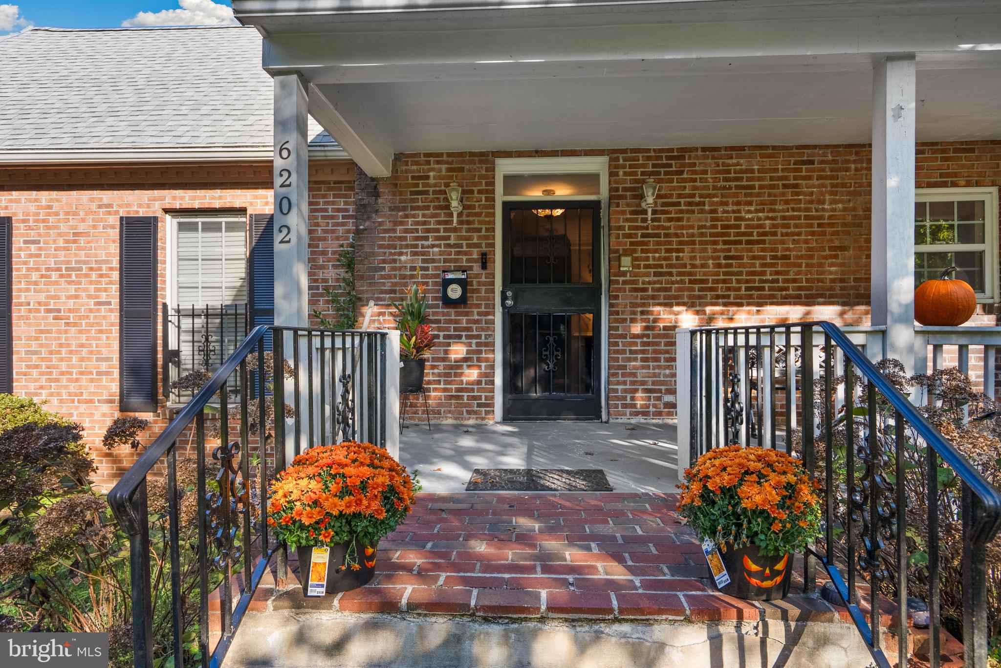 6202 State Street Cheverly, MD 20785 - Photo 6 of 34 a vase of flowers sitting on a table