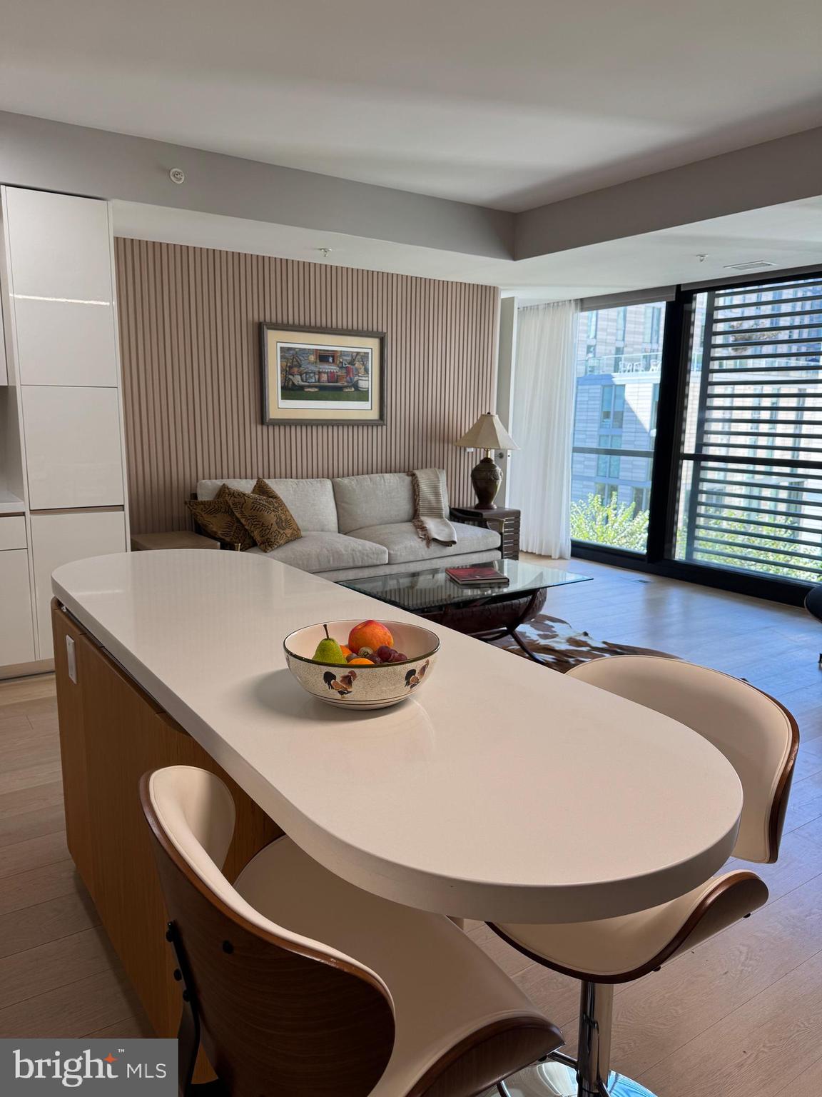 920 I Street Northwest, Unit 504505 Washington, DC 20001 - Photo 4 of 17 a room with furniture and window