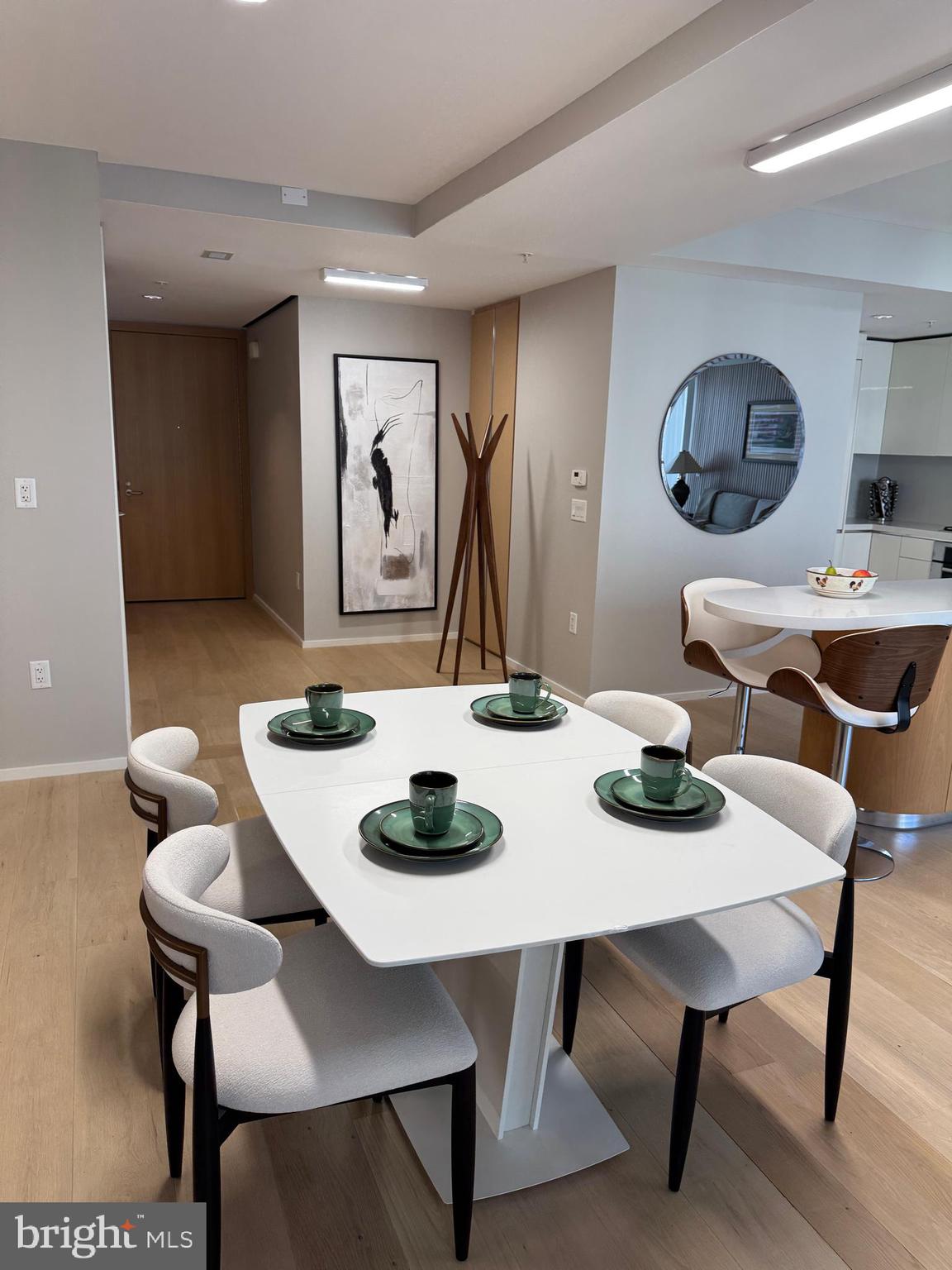 920 I Street Northwest, Unit 504505 Washington, DC 20001 - Photo 8 of 17 a view of a dining room with furniture
