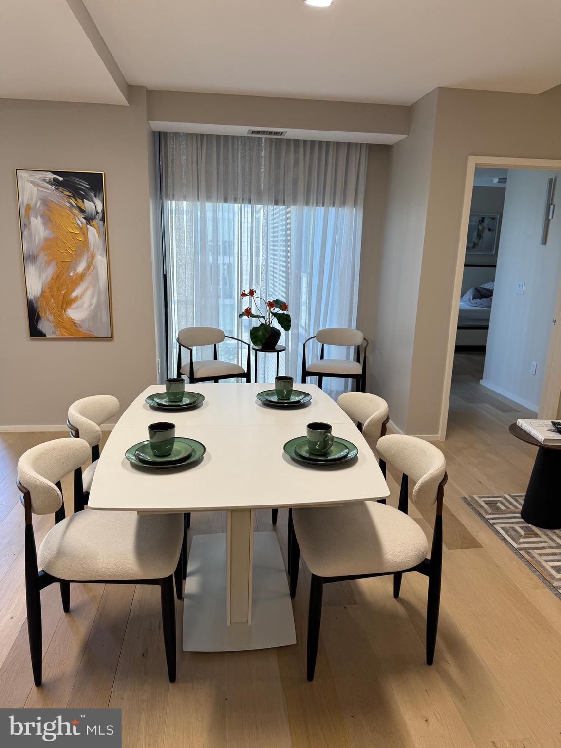 920 I Street Northwest, Unit 504505 Washington, DC 20001 - Photo 9 of 17 a view of a dining room with furniture