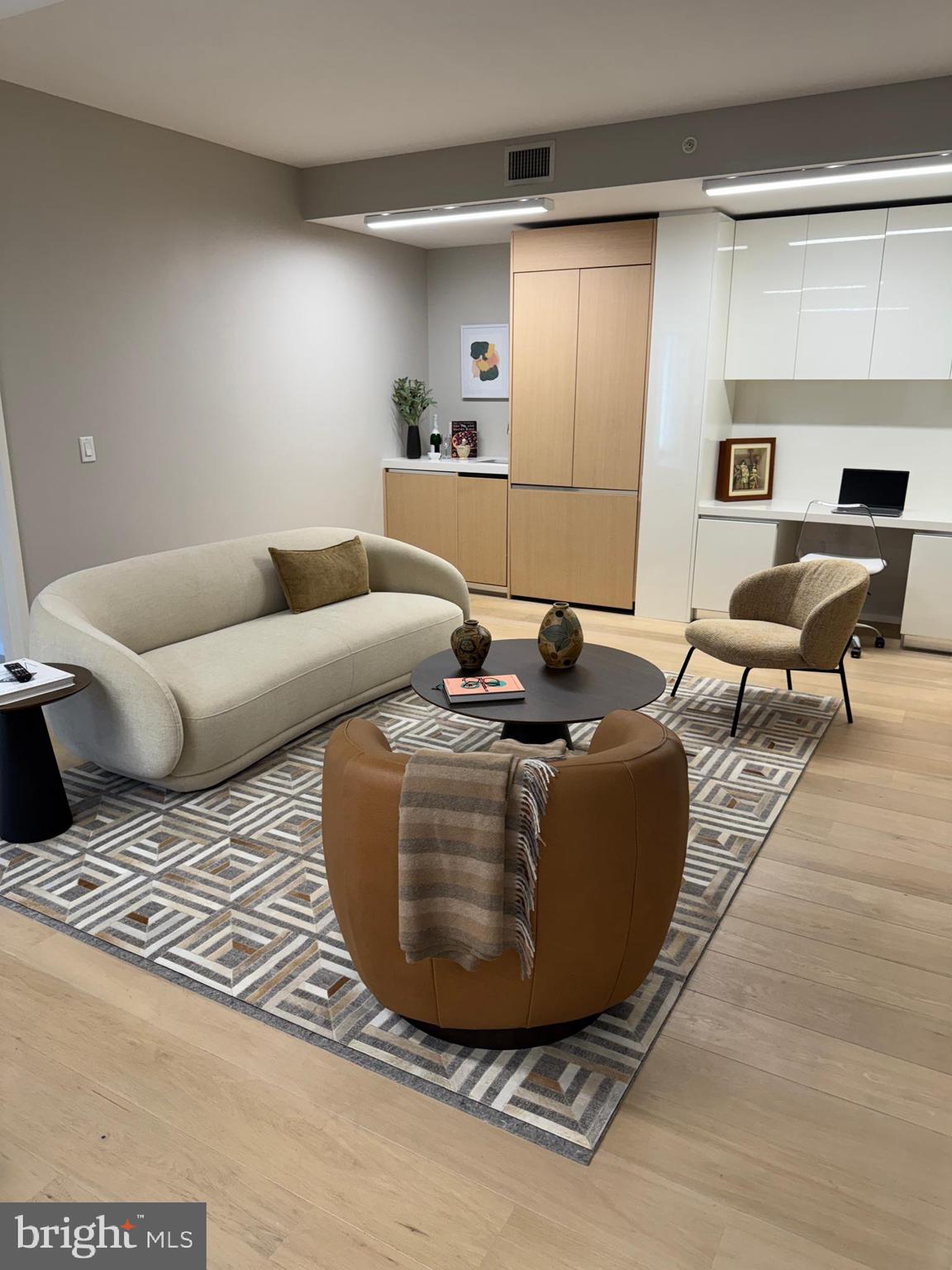 920 I Street Northwest, Unit 504505 Washington, DC 20001 - Photo 10 of 17 a living room with furniture