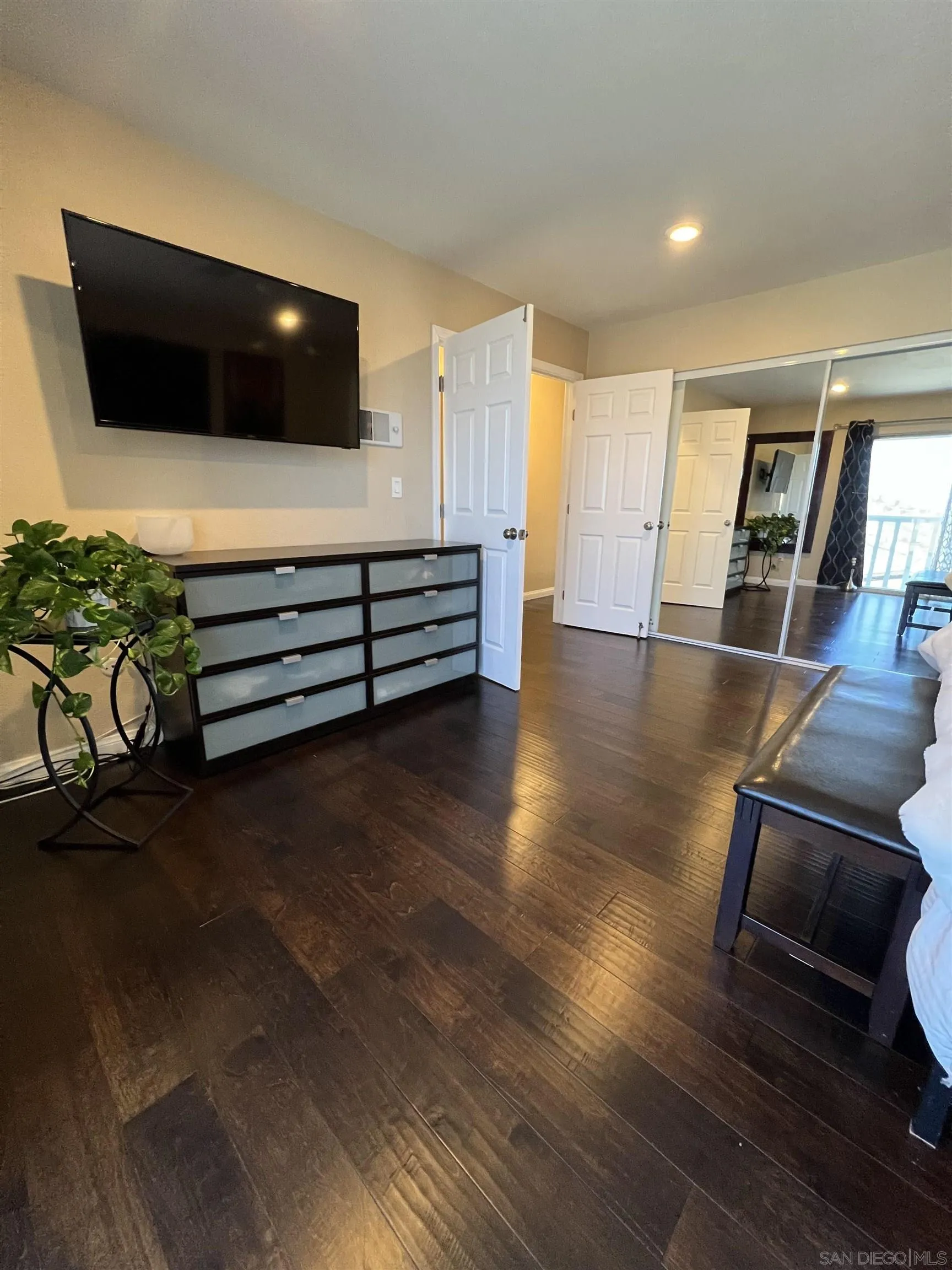 9849 Chestnut Street Spring Valley, CA 91977 - Photo 18 of 27 a living room with furniture and a flat screen tv