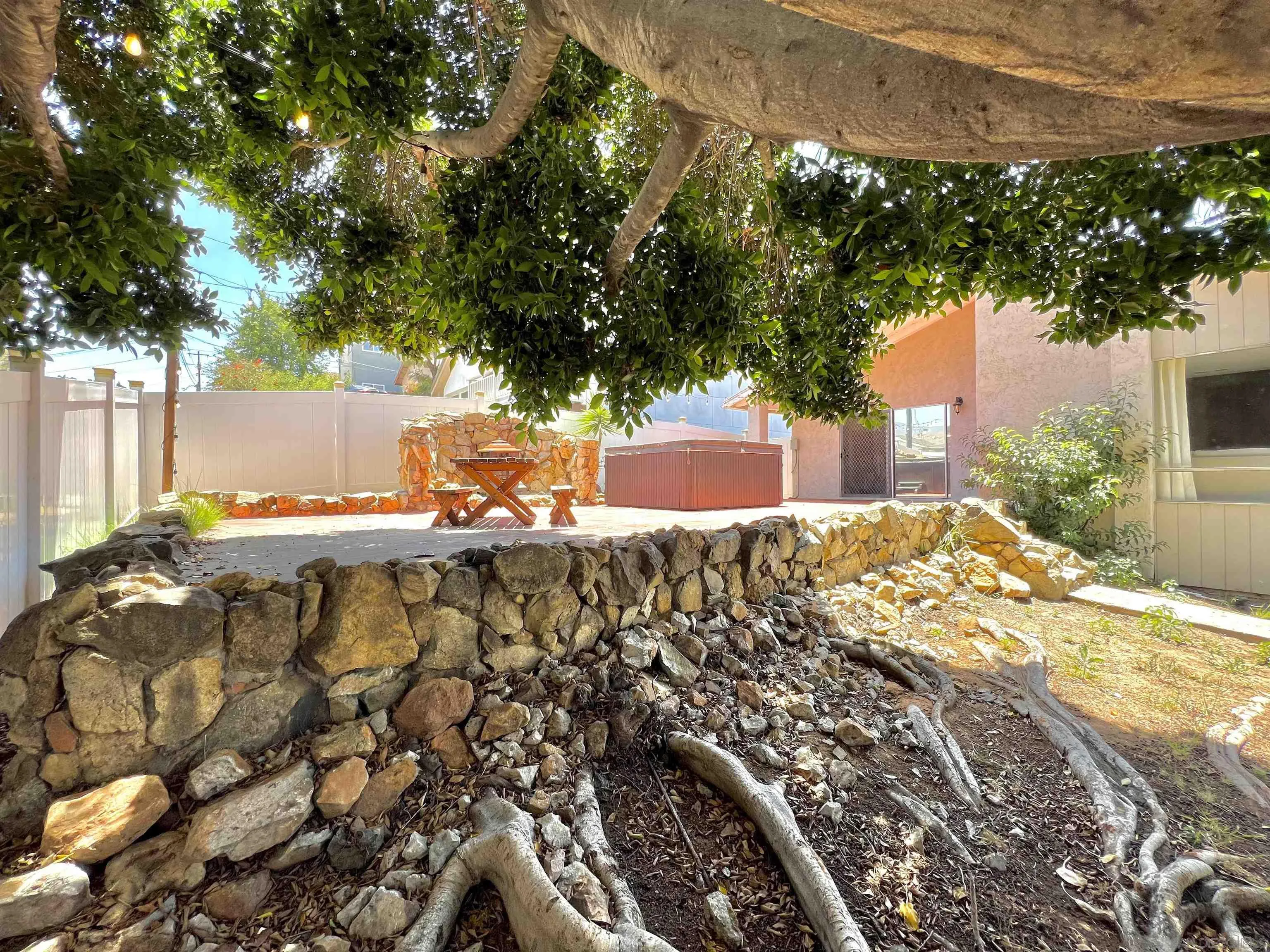 9849 Chestnut Street Spring Valley, CA 91977 - Photo 22 of 27 a view of a house with a yard