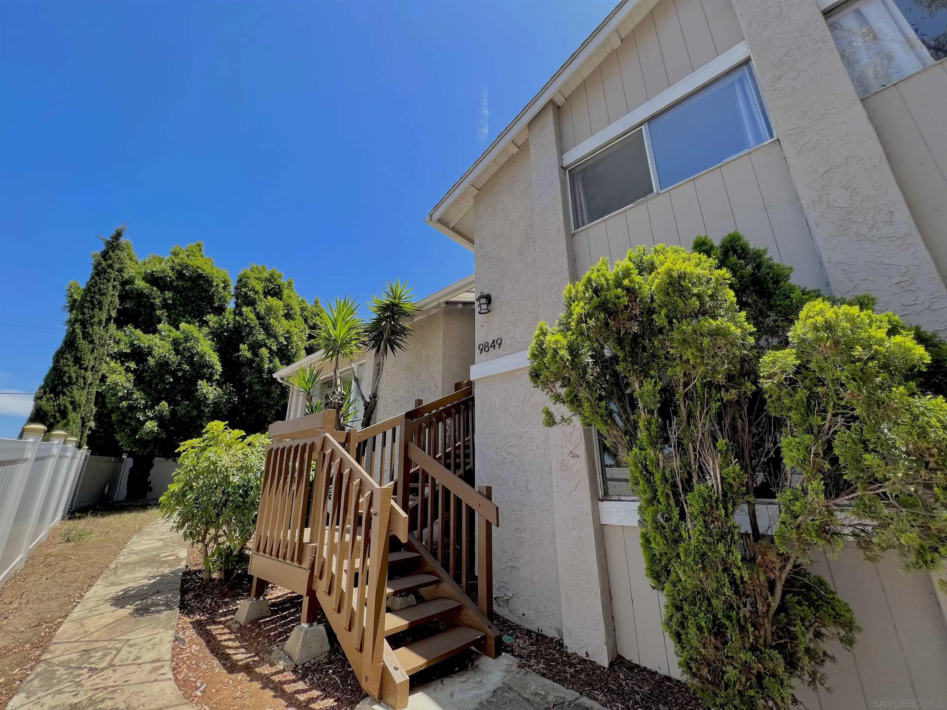 9849 Chestnut Street Spring Valley, CA 91977 - Photo 23 of 27 a view of a flower in a yard