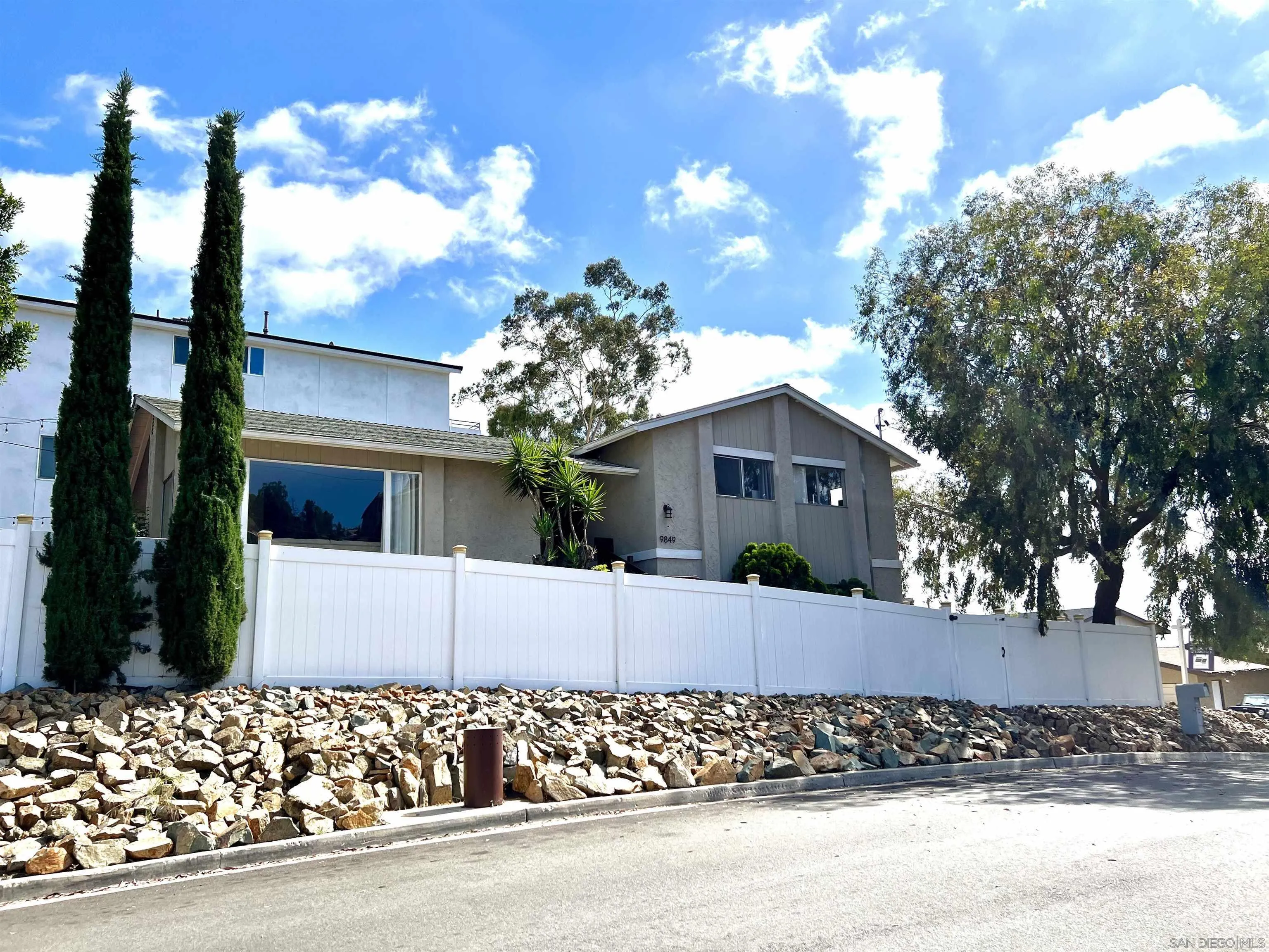 9849 Chestnut Street Spring Valley, CA 91977 - Photo 25 of 27 front view of a house with a street