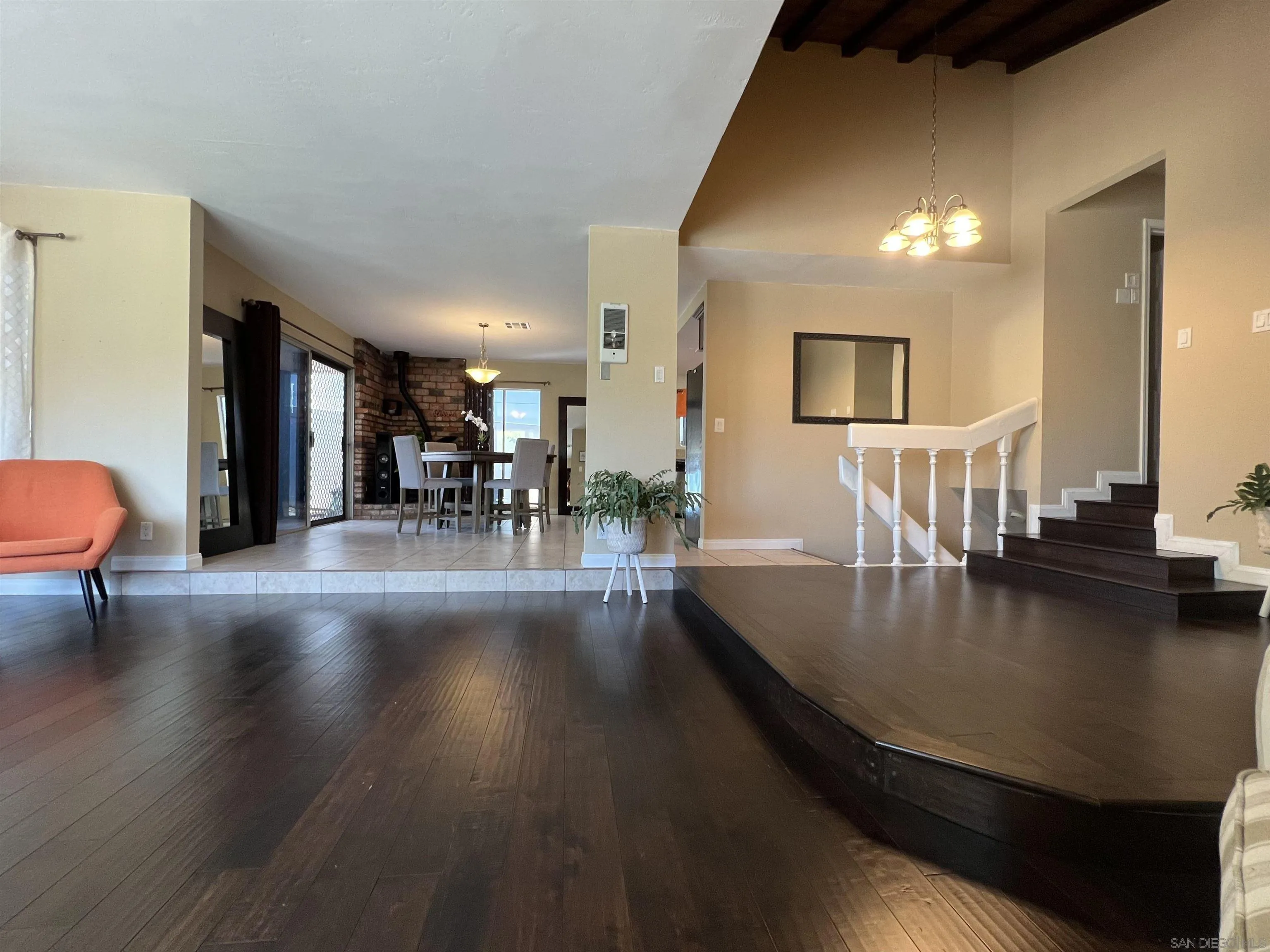 9849 Chestnut Street Spring Valley, CA 91977 - Photo 4 of 27 a view of dining room with furniture and wooden floor