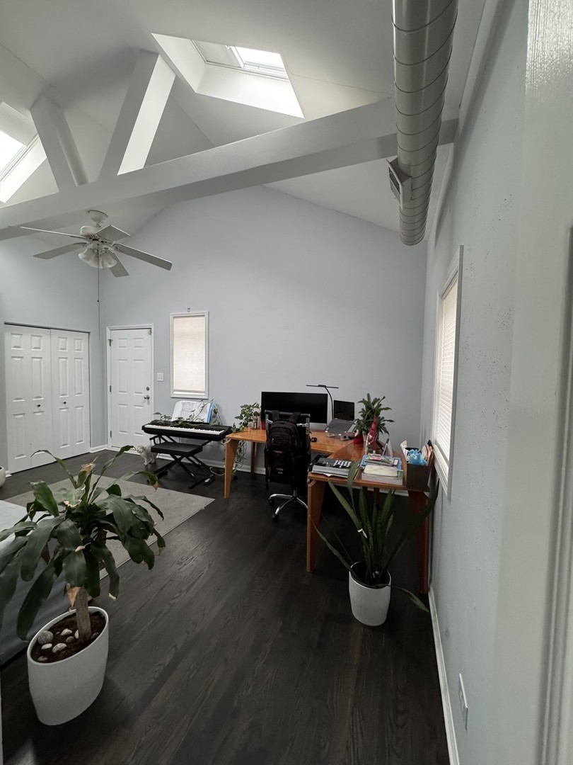 2315 West Harrison Street, Unit 4 Chicago, IL 60612 - Photo 6 of 9 a room with furniture a rug and white walls