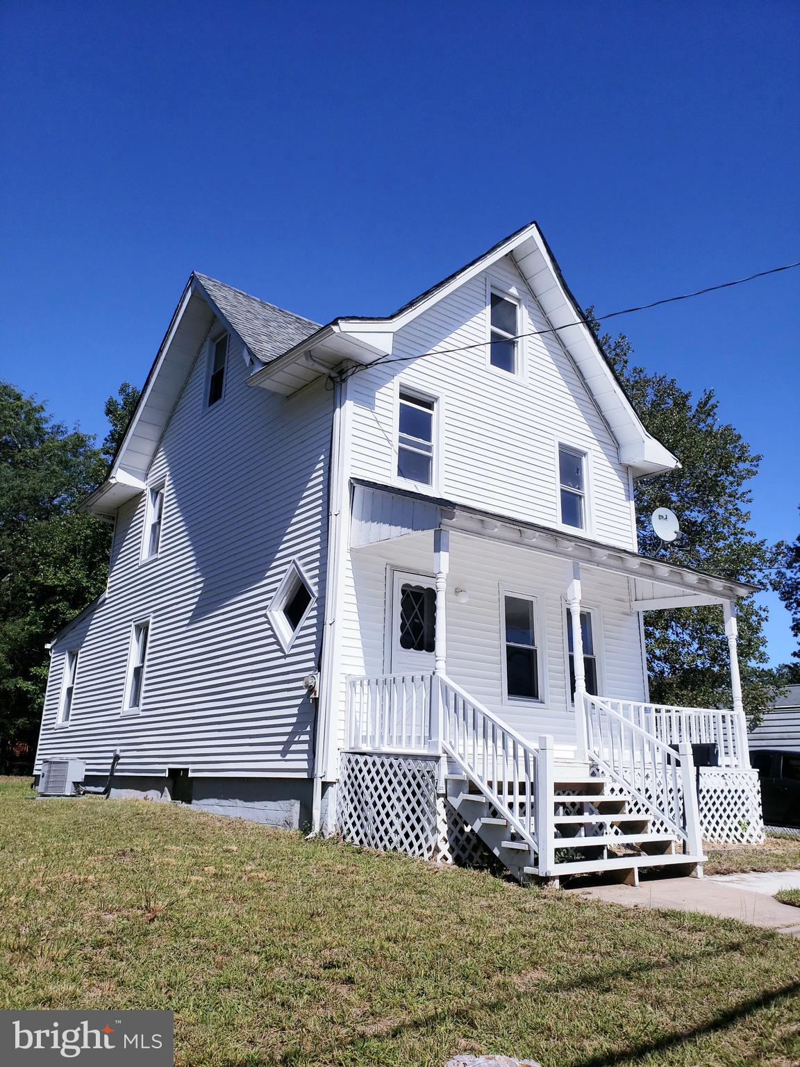 595 Berlin Road Clementon, NJ 08021 - Photo 1 of 24 a front view of a house with a yard