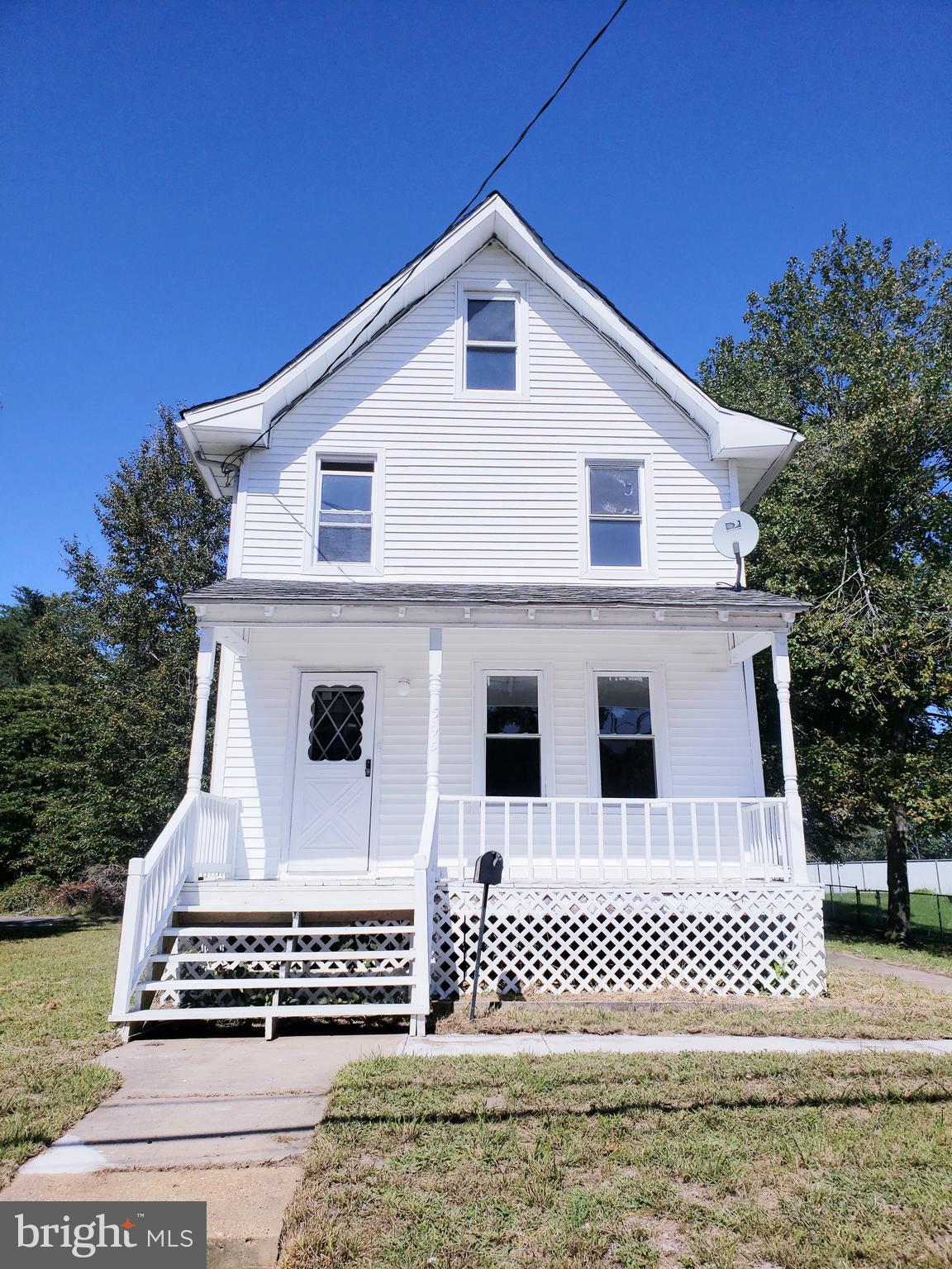 595 Berlin Road Clementon, NJ 08021 - Photo 2 of 24 a front view of a house with a yard
