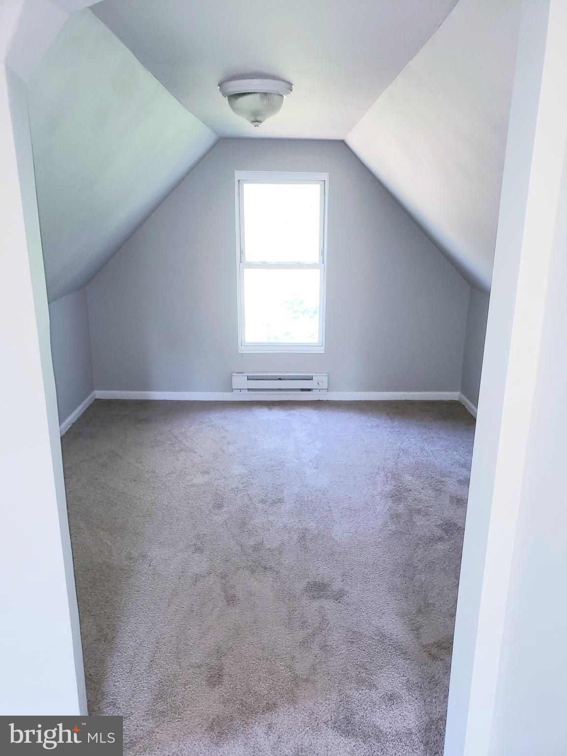 595 Berlin Road Clementon, NJ 08021 - Photo 15 of 24 an empty room with a window