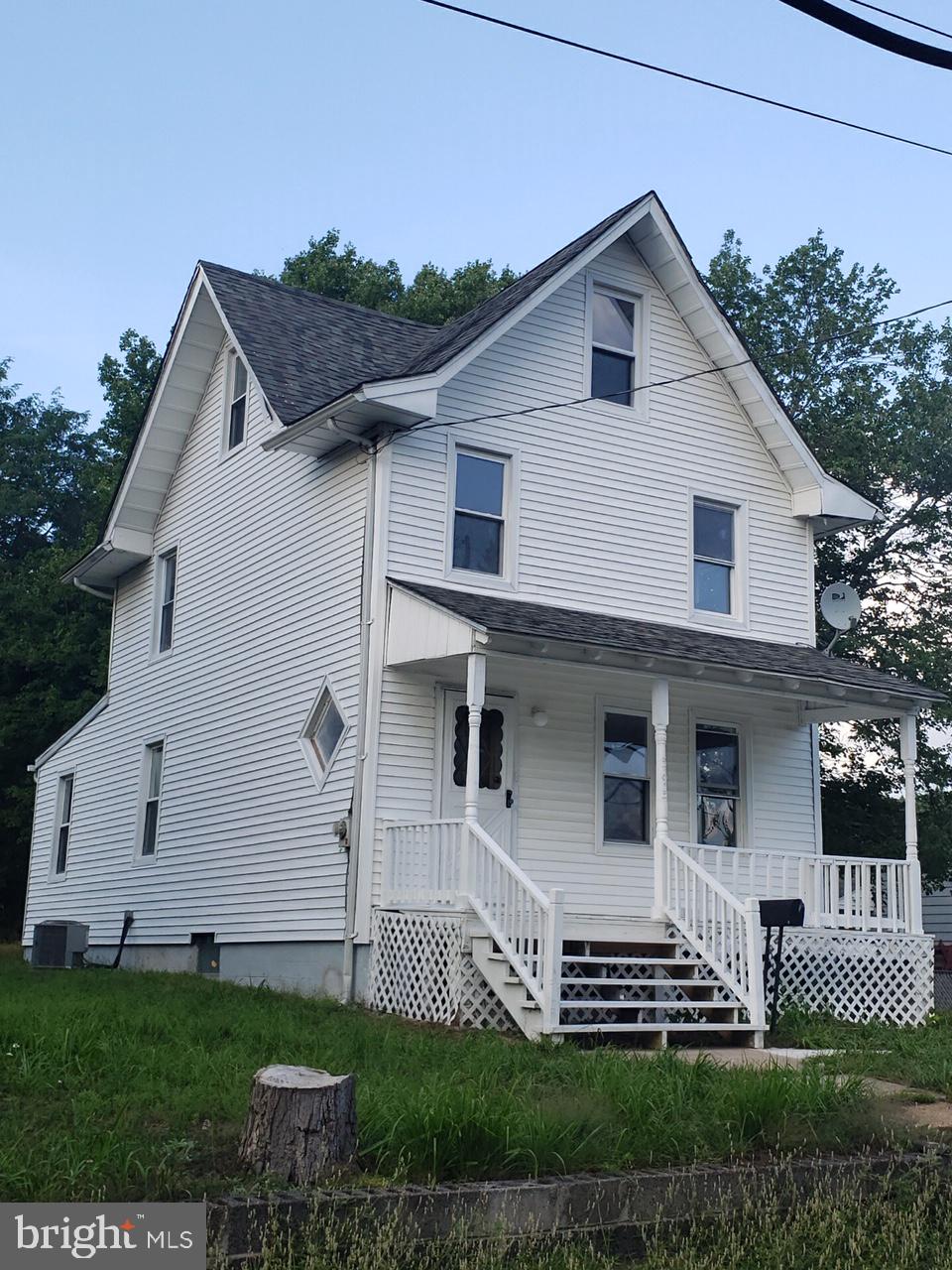 595 Berlin Road Clementon, NJ 08021 - Photo 17 of 24 a front view of a house with a yard