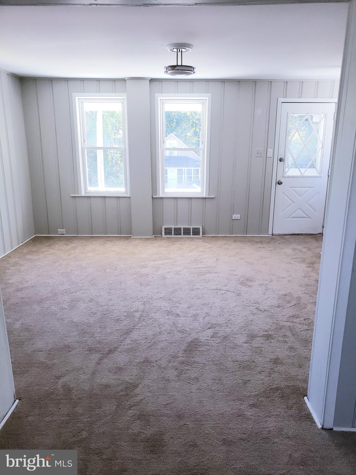 595 Berlin Road Clementon, NJ 08021 - Photo 4 of 24 an empty room with windows