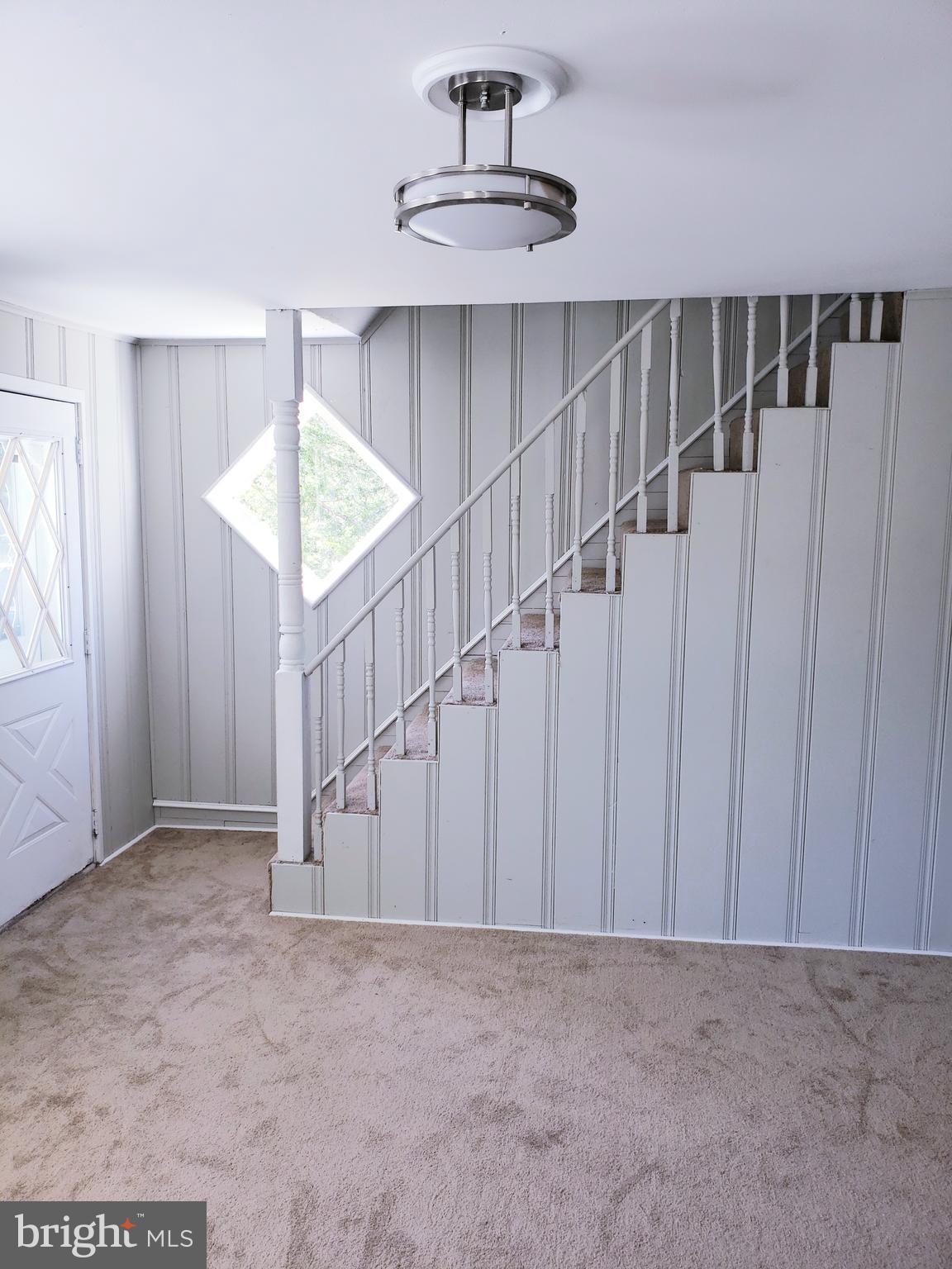 595 Berlin Road Clementon, NJ 08021 - Photo 6 of 24 a view of an empty room with a window