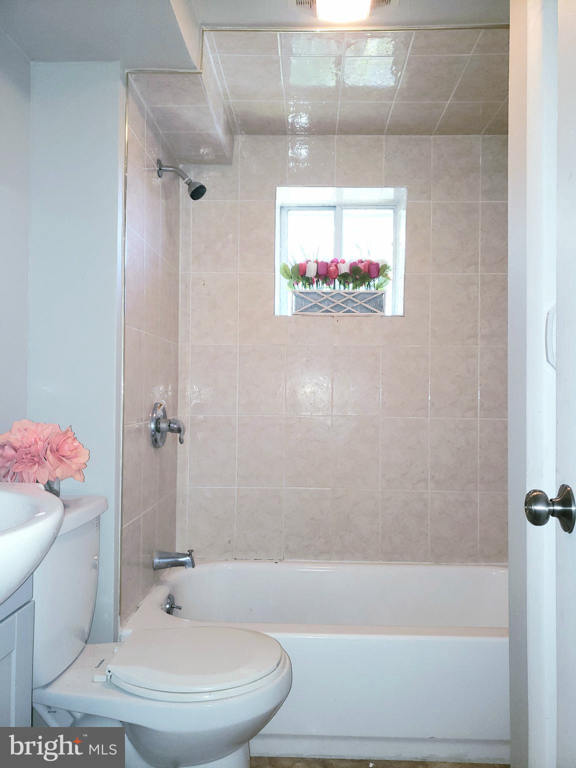 595 Berlin Road Clementon, NJ 08021 - Photo 8 of 24 a bathroom with a toilet and a shower
