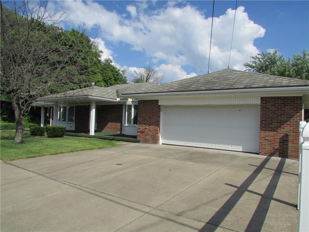 98 Devils Den Road Burgettstown, PA 15021 - Photo 1 of 23 EXTERIOR FRONT. BRICK. COVERED FRONT AND SIDE PORCH. 2 CAR ATTACHED GARAGE.