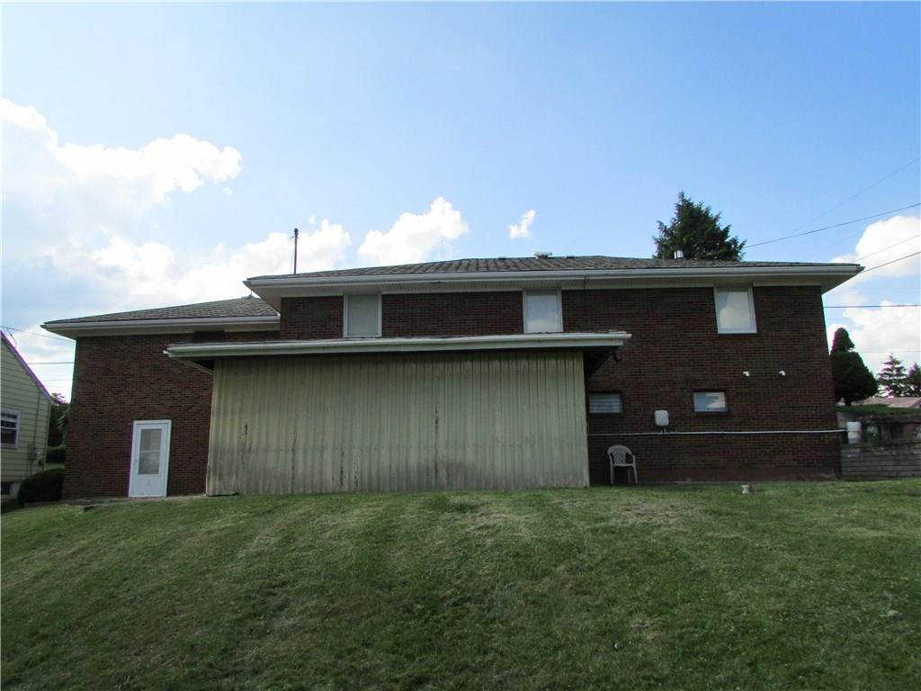 98 Devils Den Road Burgettstown, PA 15021 - Photo 7 of 23 EXTERIOR BACK. ALL BRICK.