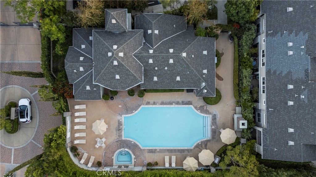 20000 Plum Canyon Road, Unit 1316 Saugus, CA 91350 - Photo 31 of 37 an aerial view of a house with garden space and a patio