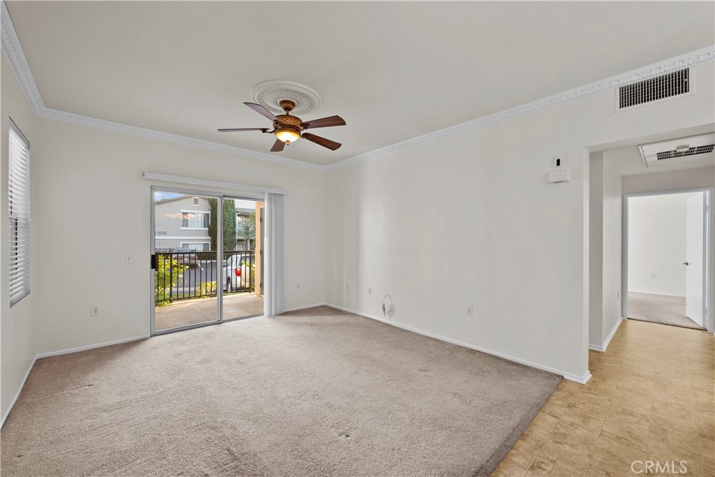 20000 Plum Canyon Road, Unit 1316 Saugus, CA 91350 - Photo 5 of 37 a view of an empty room with a window