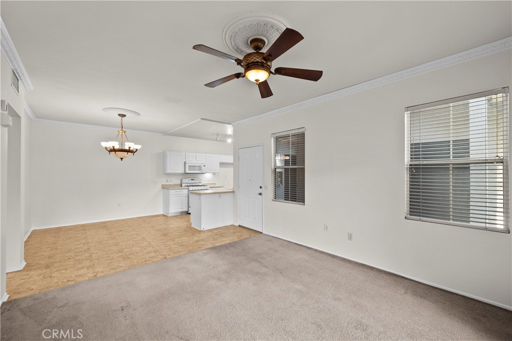 20000 Plum Canyon Road, Unit 1316 Saugus, CA 91350 - Photo 6 of 37 a living room with furniture and a window