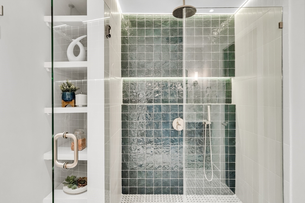 70 Birch Hill Road Belmont, MA 02478 - Photo 19 of 41 a bathroom with a shower and a mirror
