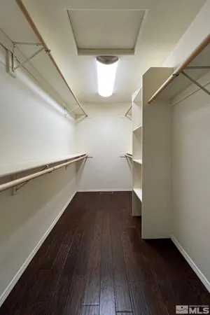 a view of an empty walk in closet
