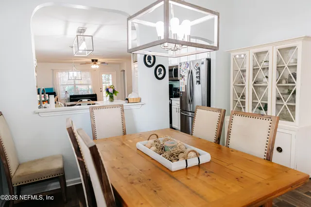 a view of a dining room with furniture