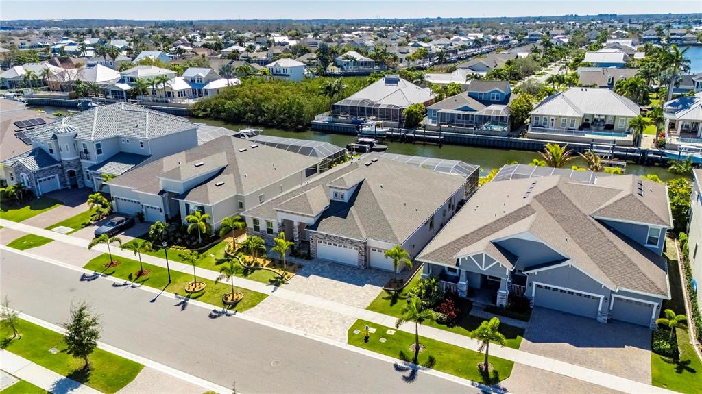 994 Signet Drive Apollo Beach, FL 33572 - Photo 78 of 98 an aerial view of a house with a swimming pool yard and outdoor seating