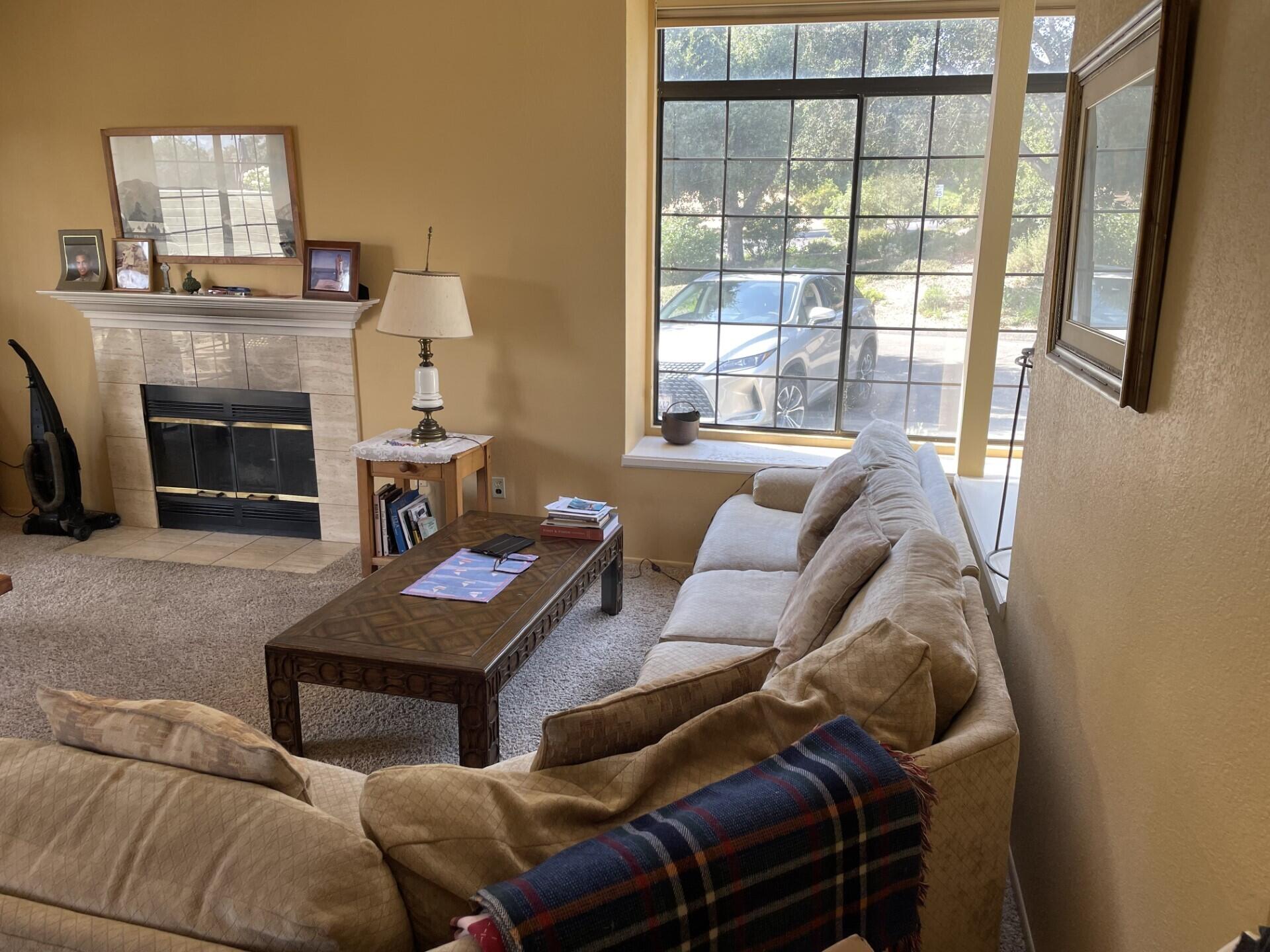 702 Hillside Drive Solvang, CA 93463 - Photo 3 of 15 a living room with furniture and a fireplace
