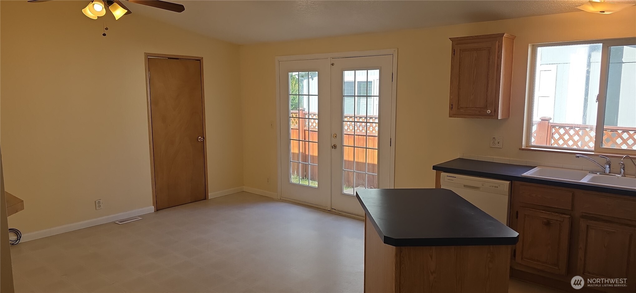 6164 Cedar Lane Maple Falls, WA 98266 - Photo 5 of 15 a dining room with a window and wooden floor