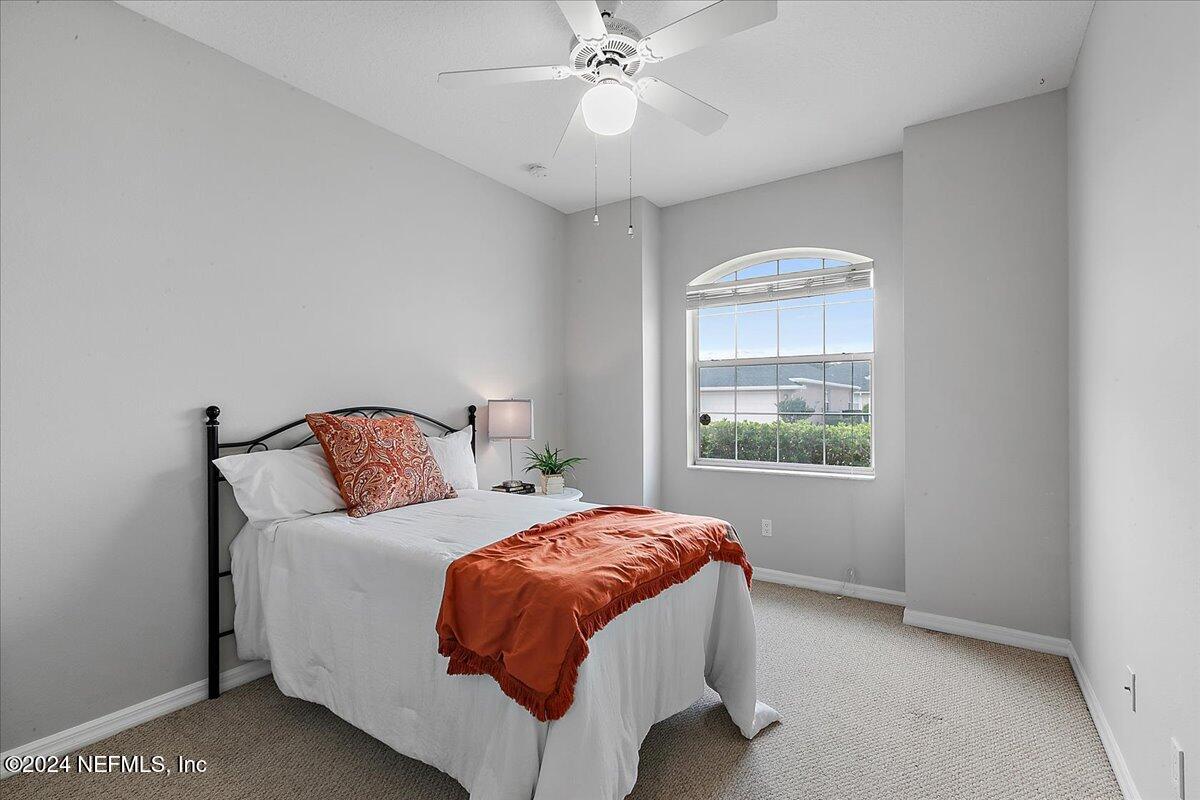 1053 Ridgewood Lane St. Augustine, FL 32086 - Photo 13 of 23 a bedroom with a bed and a window
