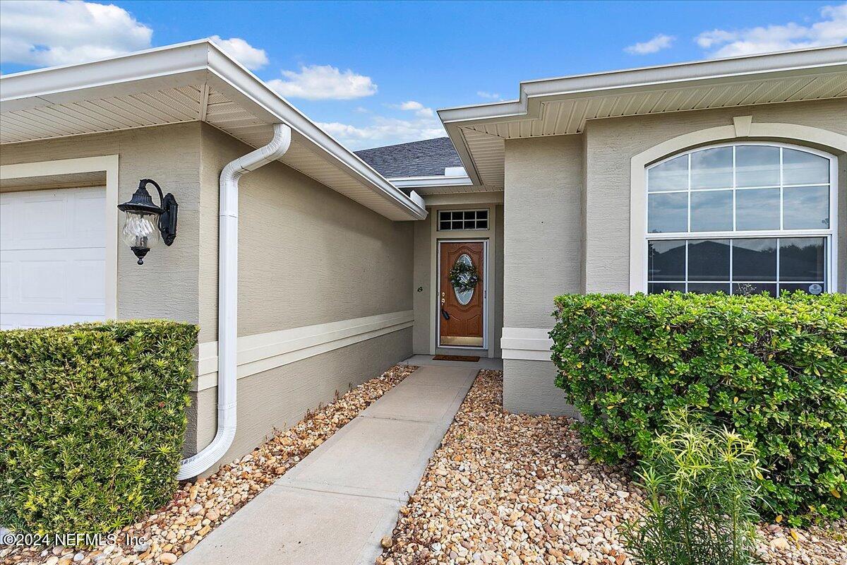 1053 Ridgewood Lane St. Augustine, FL 32086 - Photo 2 of 23 a view of a house with a yard