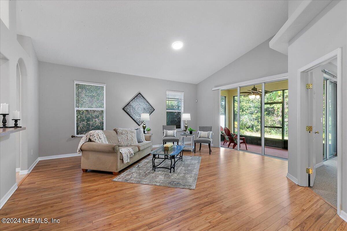 1053 Ridgewood Lane St. Augustine, FL 32086 - Photo 5 of 23 a living room with furniture and a wooden floor