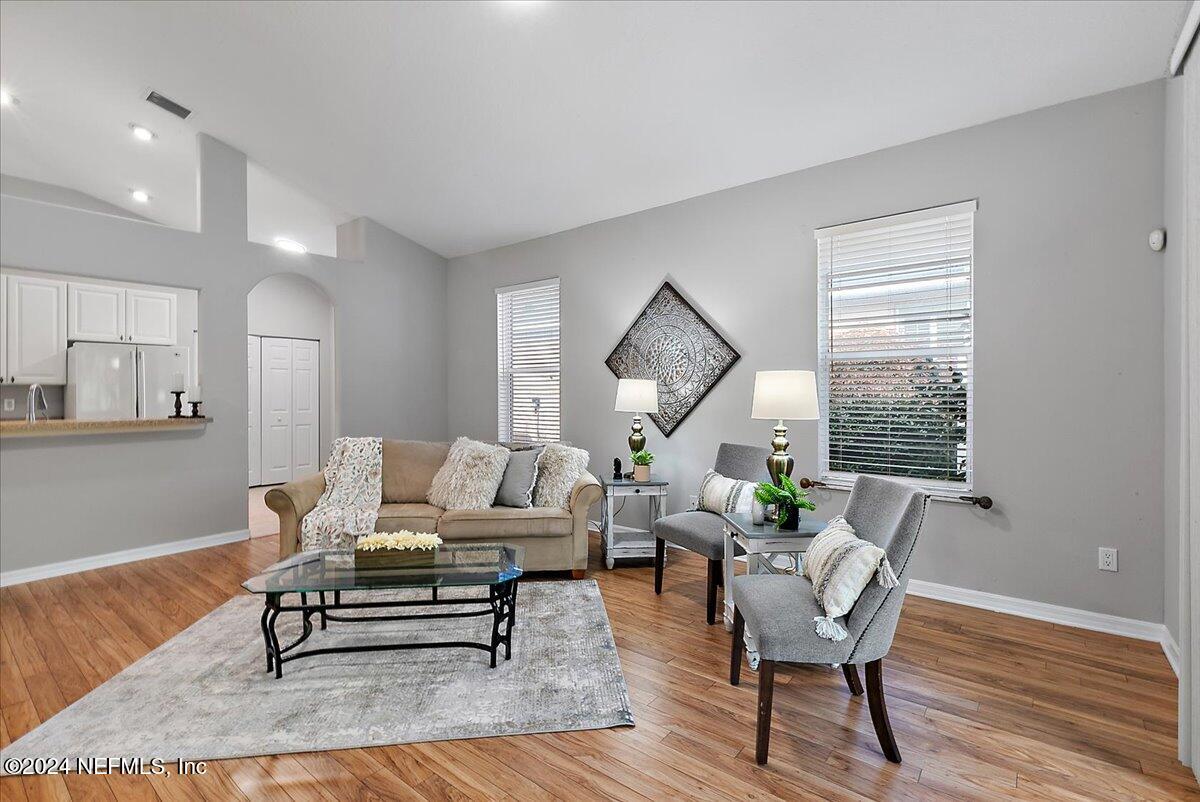 1053 Ridgewood Lane St. Augustine, FL 32086 - Photo 6 of 23 a living room with furniture wooden floor and a window