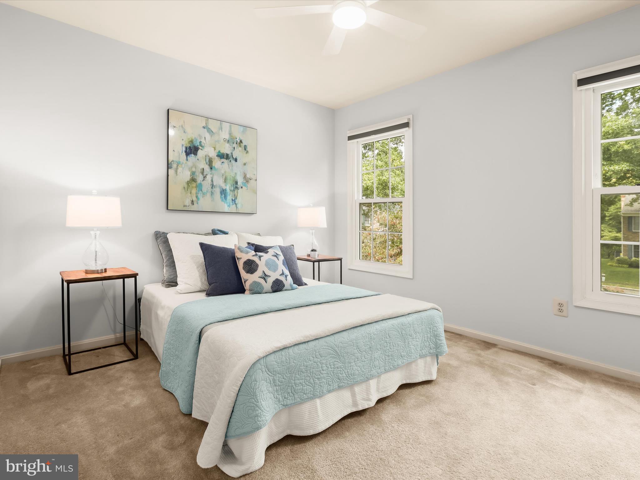 303 Riding Ridge Road Annapolis, MD 21403 - Photo 19 of 43 a bedroom with a bed and a window