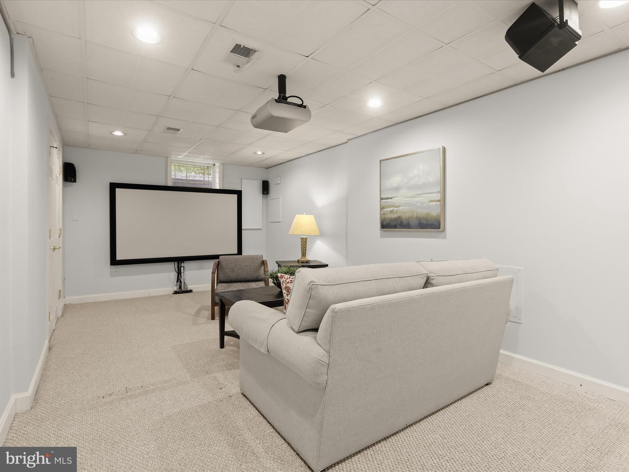 303 Riding Ridge Road Annapolis, MD 21403 - Photo 23 of 43 a living room with furniture and a flat screen tv