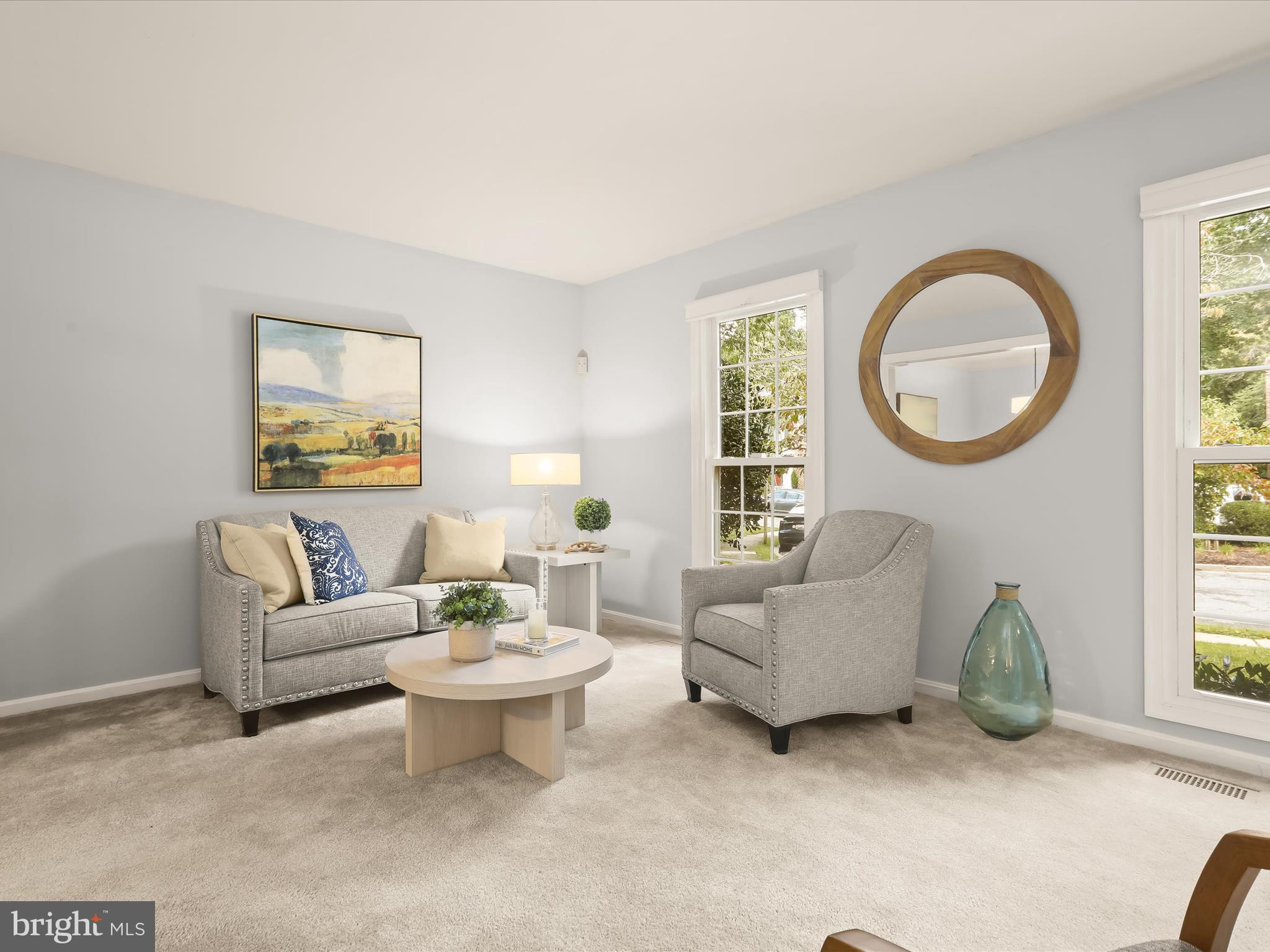 303 Riding Ridge Road Annapolis, MD 21403 - Photo 25 of 43 a living room with furniture a table and a window