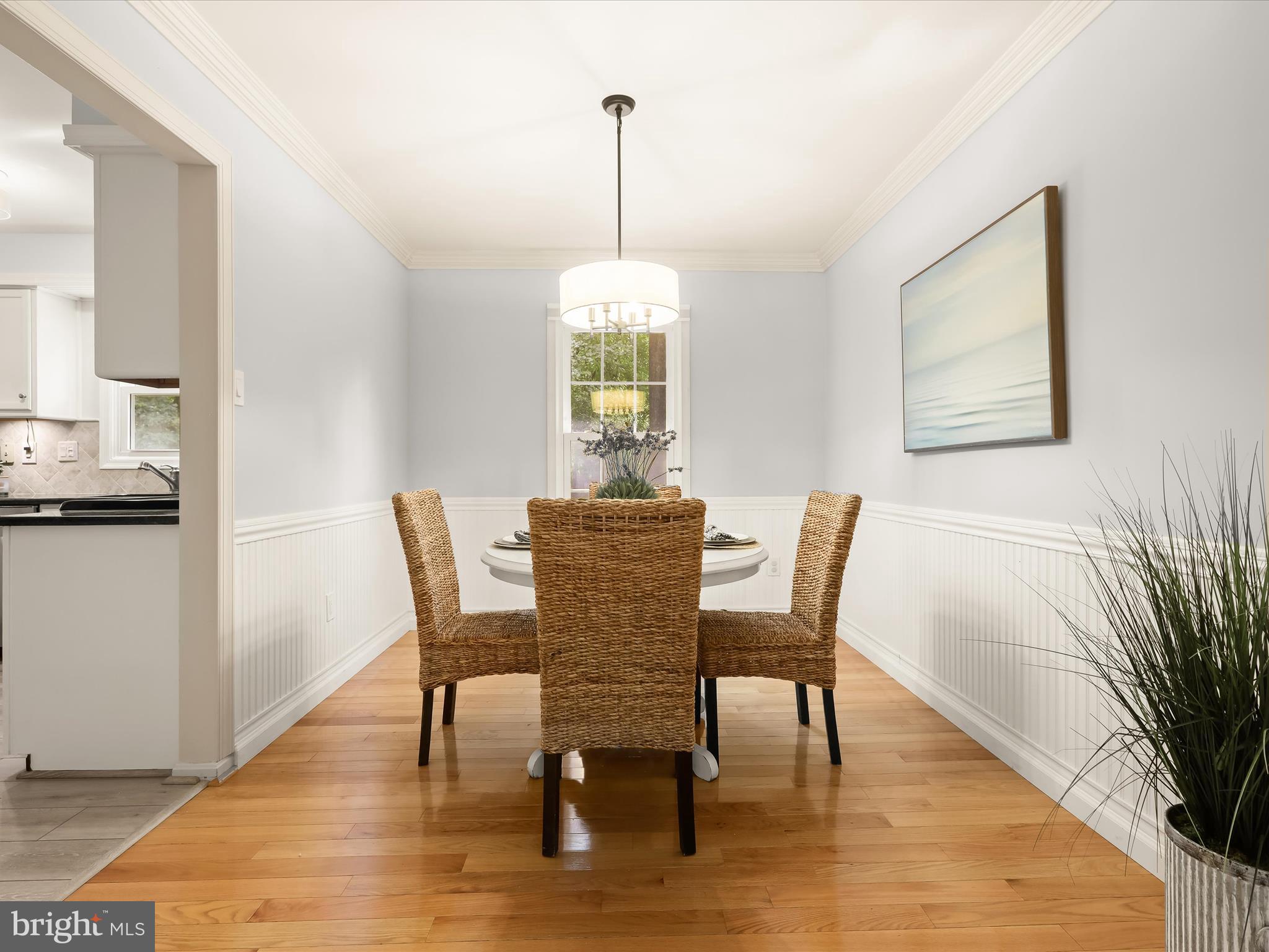303 Riding Ridge Road Annapolis, MD 21403 - Photo 29 of 43 a dining room with furniture window and wooden floor