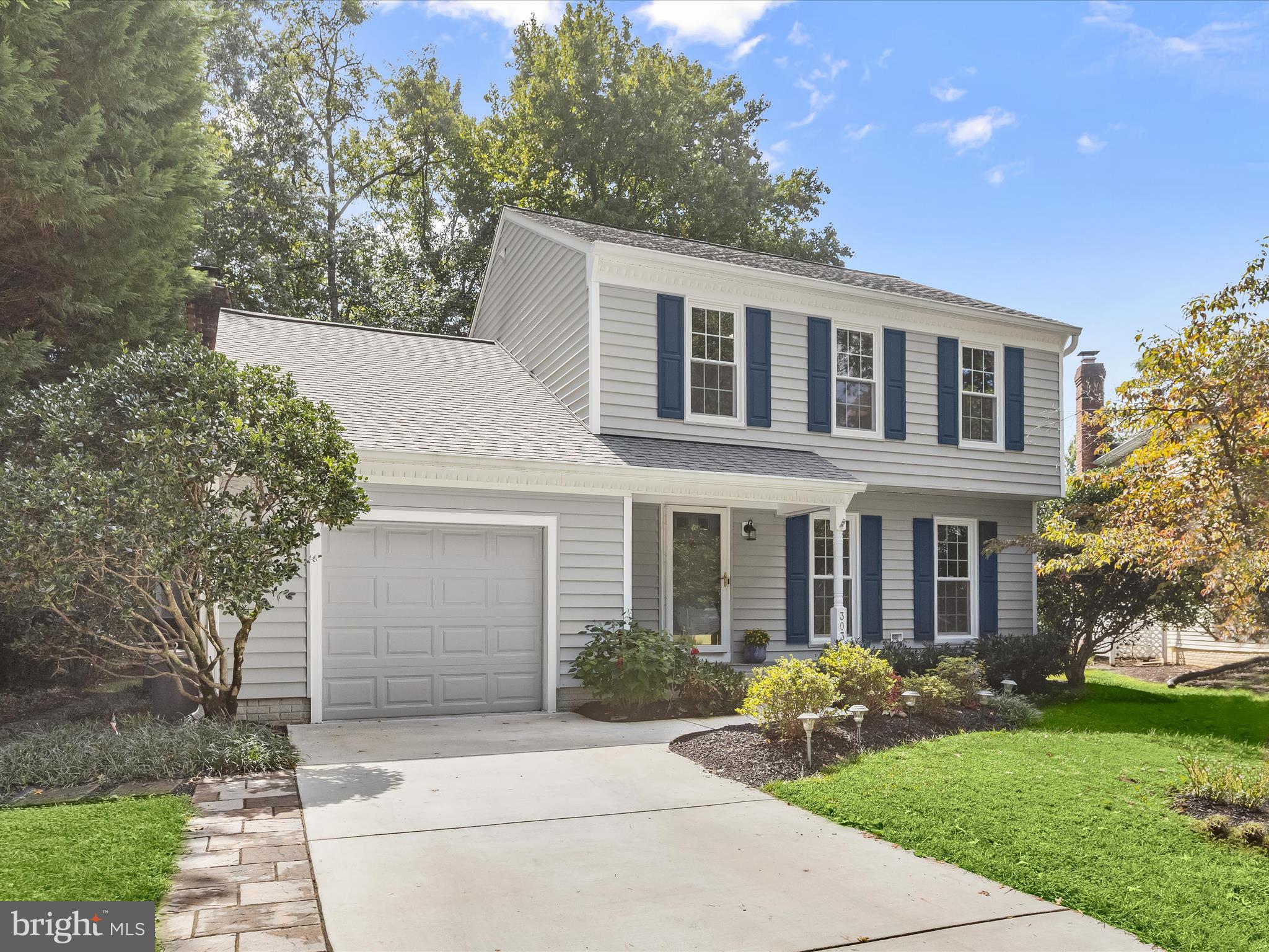303 Riding Ridge Road Annapolis, MD 21403 - Photo 32 of 43 front view of a house with a yard