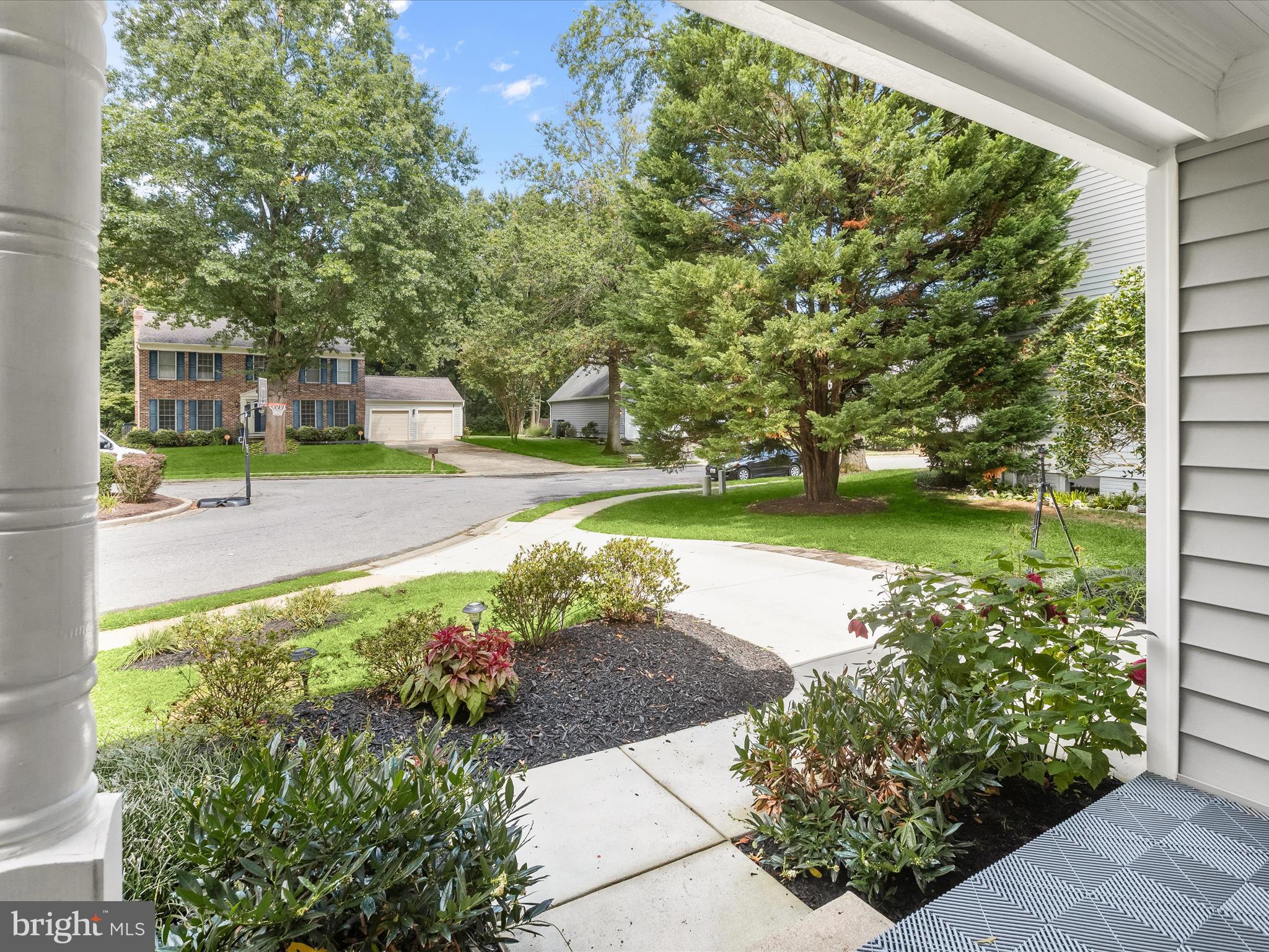 303 Riding Ridge Road Annapolis, MD 21403 - Photo 34 of 43 a view of a garden with a bench