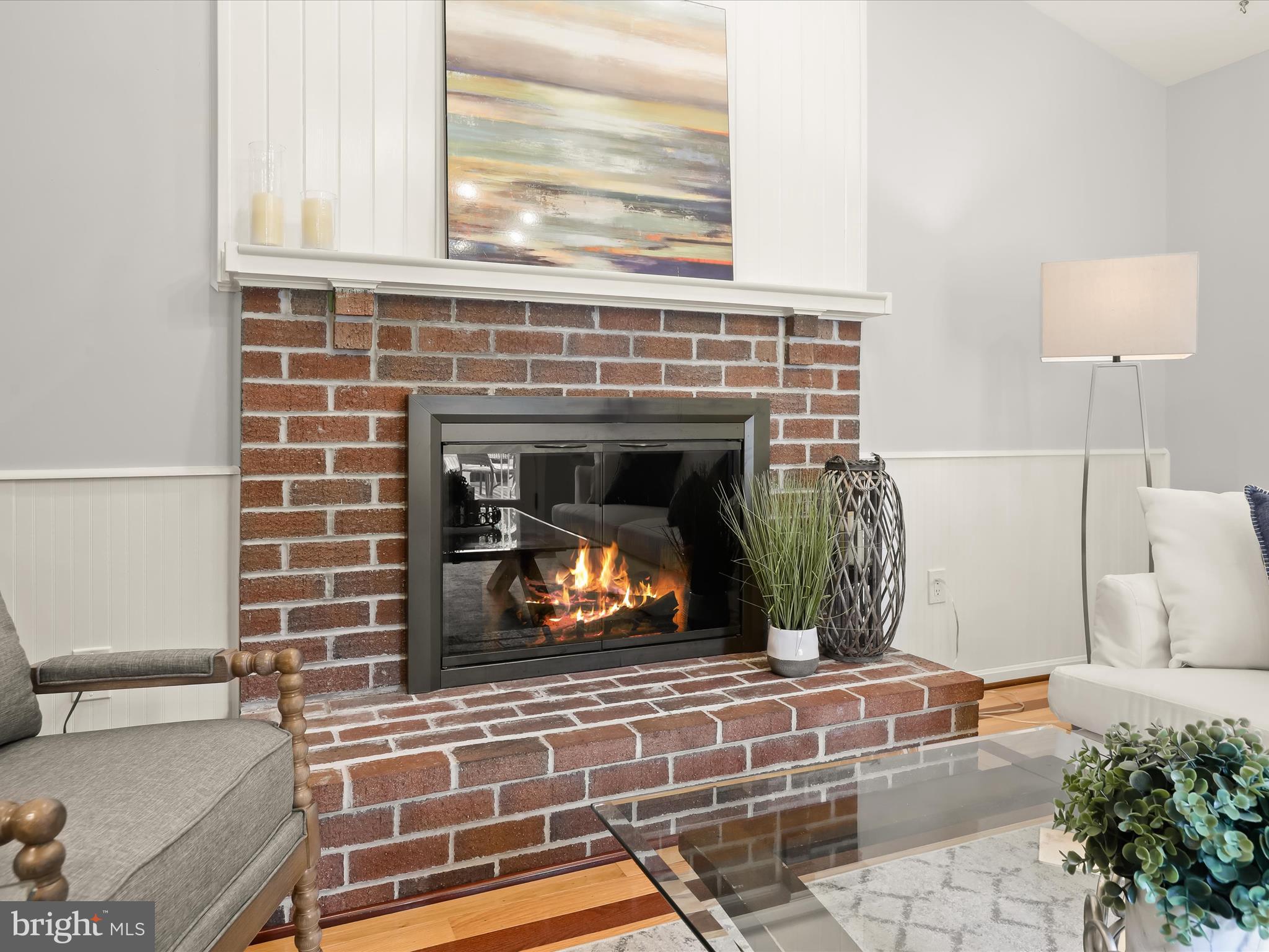 303 Riding Ridge Road Annapolis, MD 21403 - Photo 10 of 43 a living room with furniture and a fireplace