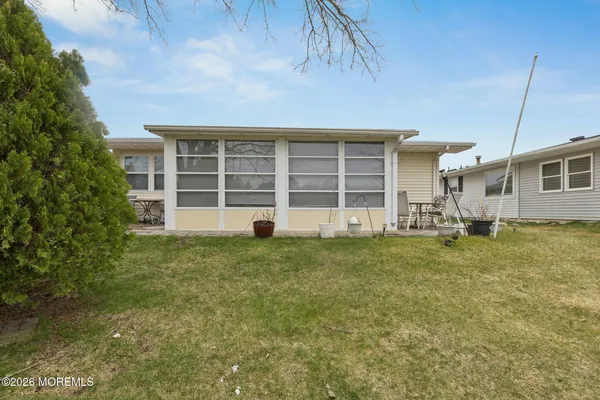 a house view with a garden space