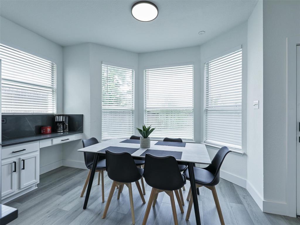 6229 Bear Run Road The Colony, TX 75056 - Photo 14 of 25 a view of a dining room with furniture and window