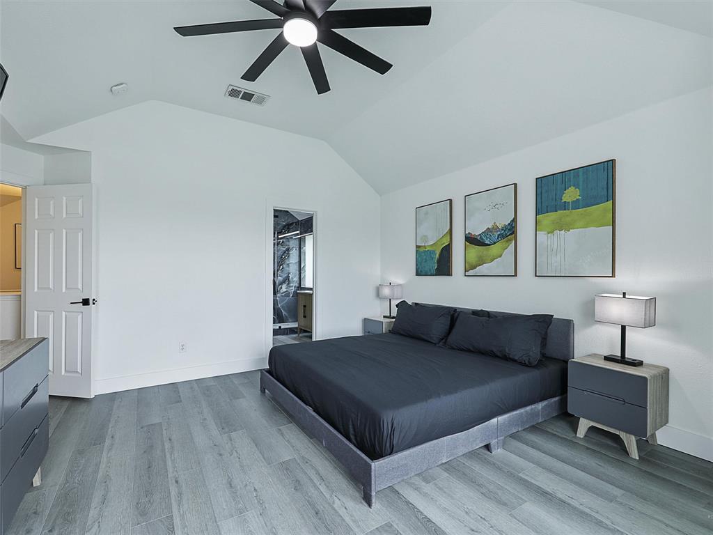 6229 Bear Run Road The Colony, TX 75056 - Photo 23 of 25 a living room with furniture and a wooden floor