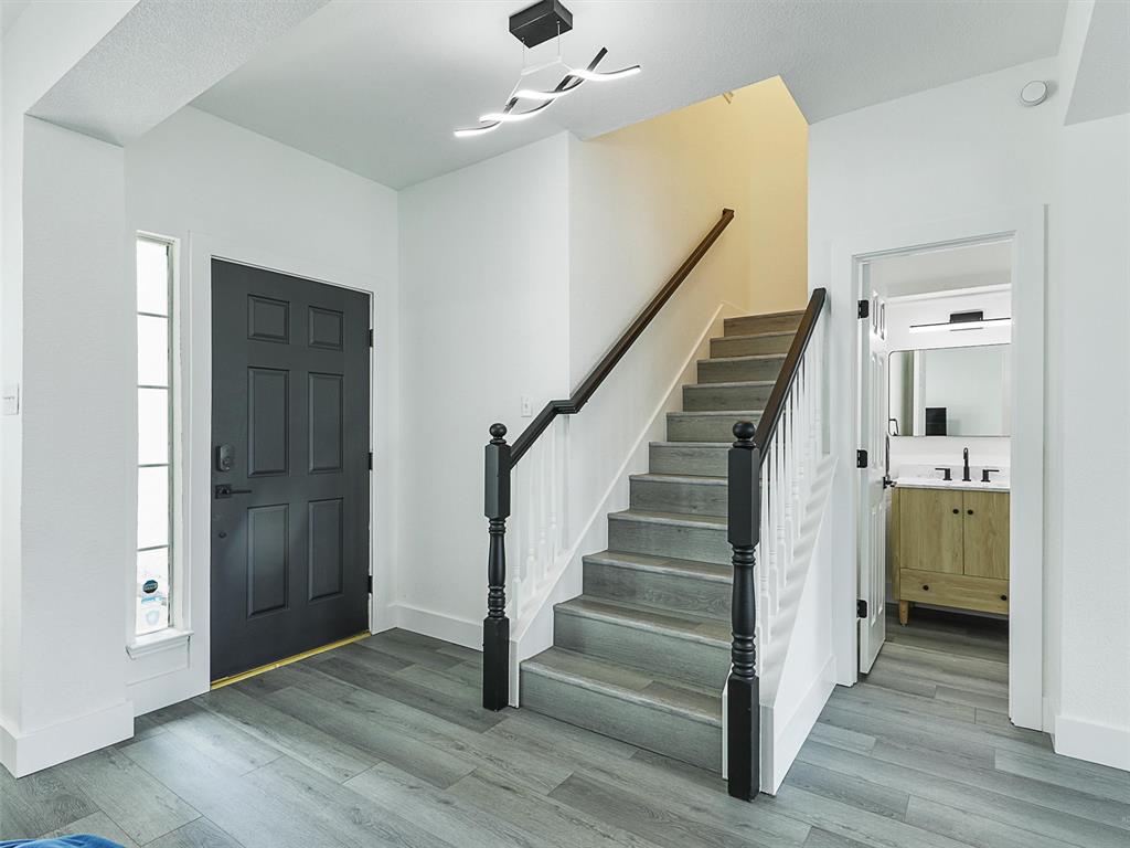 6229 Bear Run Road The Colony, TX 75056 - Photo 25 of 25 a view of entryway with wooden floor